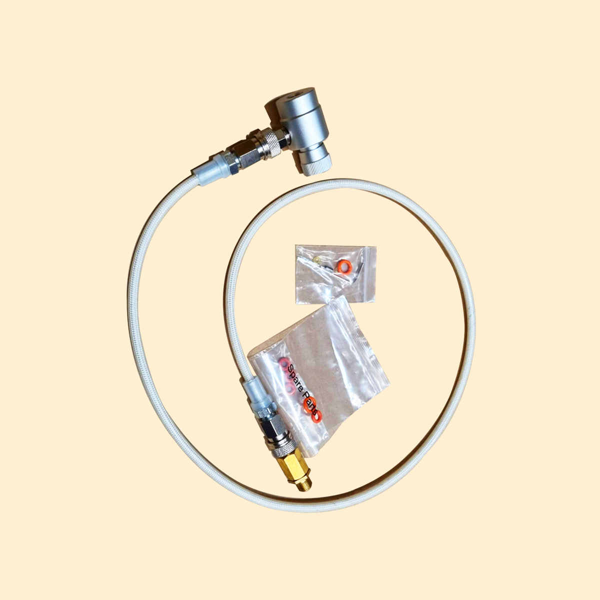 Adapter kit for a rapid infusion machine with O rings and flexible tube.